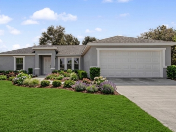 Clean architectural lines and high curb appeal make The Jacob Model an ideal choice for affordable new home buyers.
